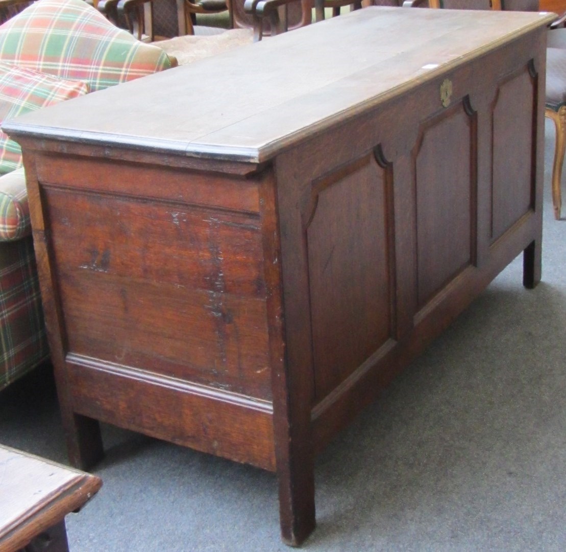 Appraisal: A late th century oak coffer the plank top over