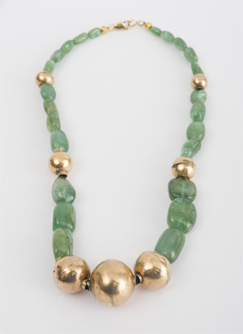 Appraisal: Tumbled Emerald and Gold-Filled Beaded Necklace With gold-filled beads in