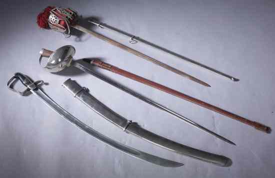 Appraisal: THREE ANTIQUE ENGLISH SWORDS George III Pattern Light Cavalry Trooper's