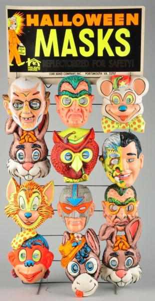 Appraisal: Original Halloween Masks Display in O B Description Circa s