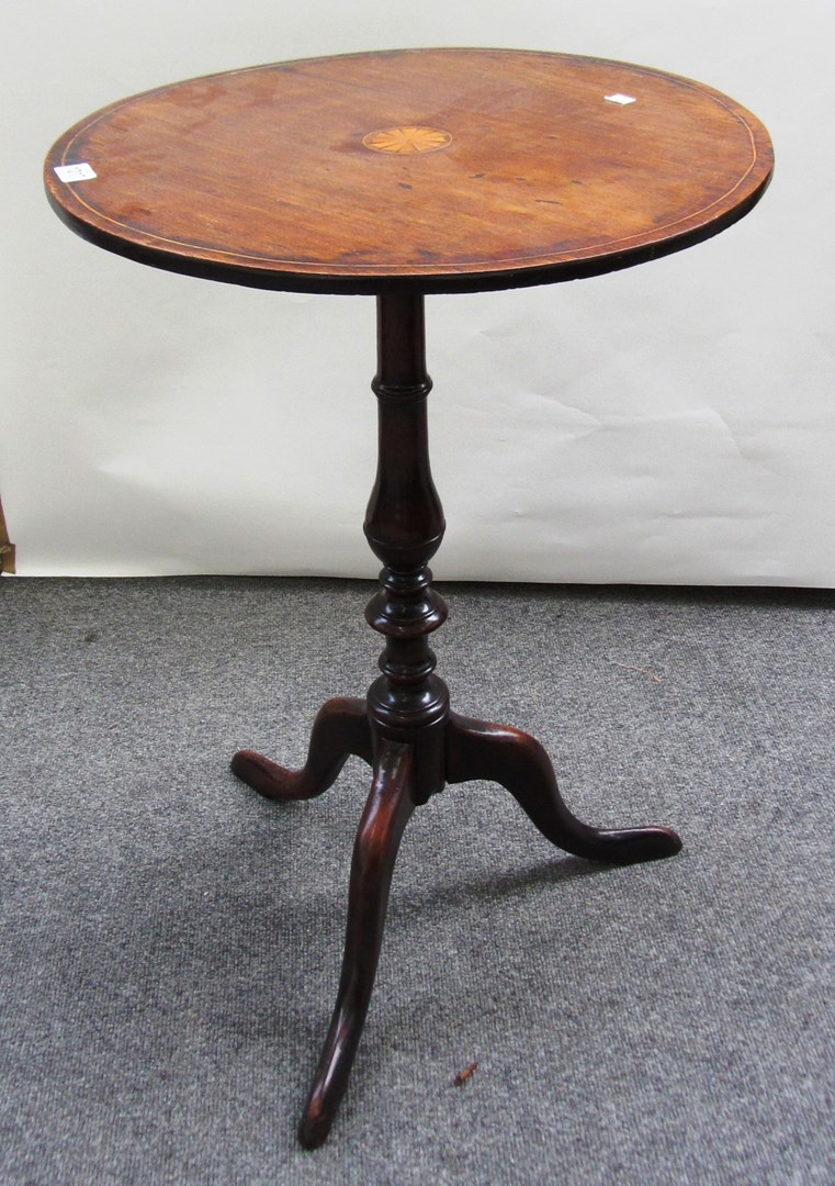 Appraisal: An early th century mahogany box strung occasional table the