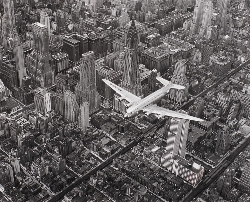 Appraisal: MARGARET BOURKE-WHITE American - A DC- Flying over New York