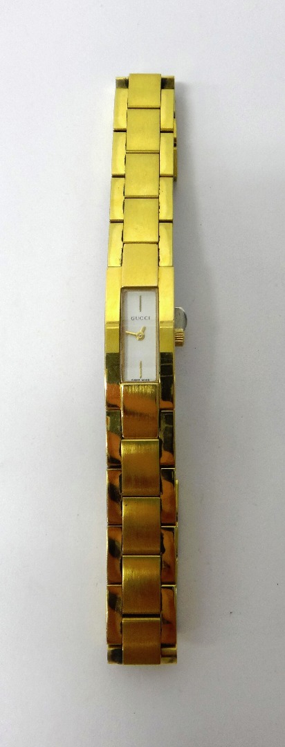 Appraisal: A lady's gilt metal Gucci bracelet wristwatch with a signed