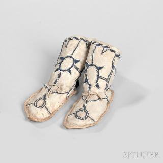 Appraisal: Apache Child's Beaded Hide High-top Moccasins c the thick rawhide