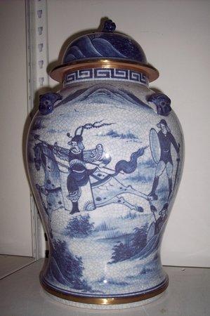 Appraisal: A blue and white crackle glaze baluster jar and cover