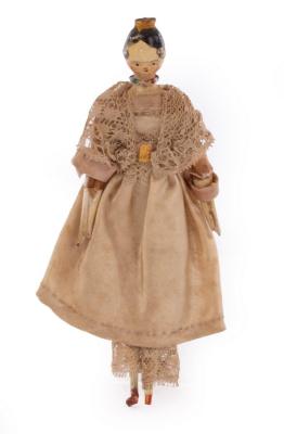 Appraisal: An th Century English painted wooden dolls house doll with