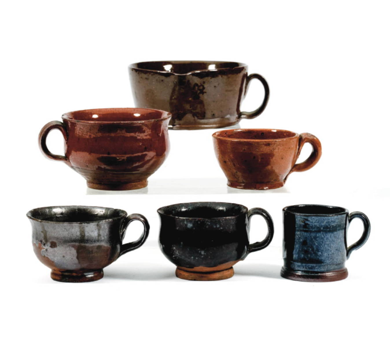 Appraisal: FOUR GLAZED REDWARE CUPS A CHILDREN quot S MUG AND