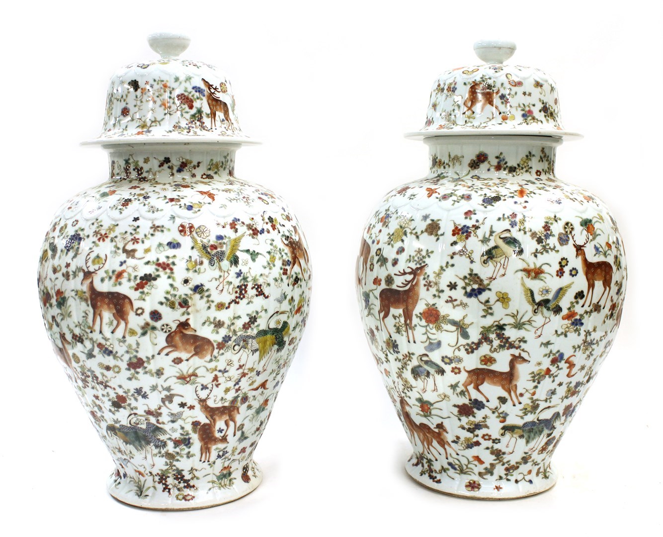 Appraisal: A pair of large Chinese famille-rose baluster vases and covers