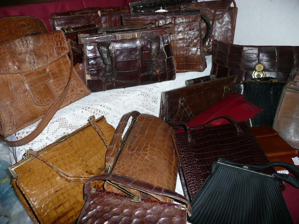 Appraisal: A large collection of vintage crocodile etc handbags Ideal for