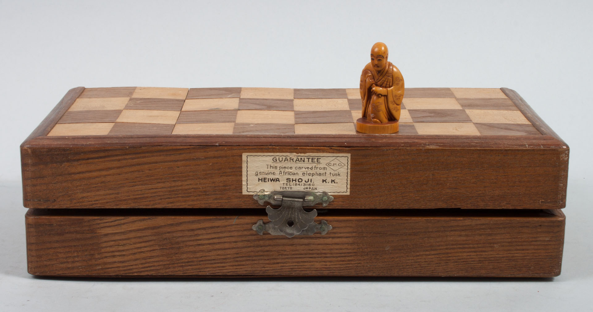 Appraisal: Japanese carved ivory chess set chessmen modeled as traditional Japanese