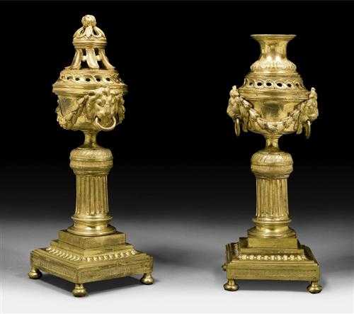 Appraisal: PAIR OF CASSOLETTES AUX TETES DE LIONS Louis XVI Paris