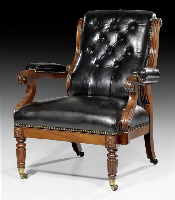 Appraisal: LIBRARY ARMCHAIR Regency England circa Carved and fluted mahogany On