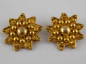 Appraisal: A pair of gilt metal tests silver ear clips measuring