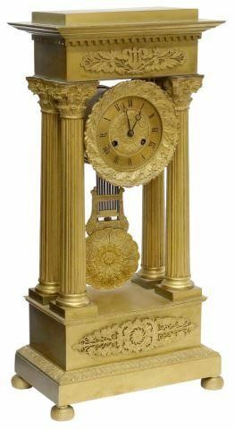 Appraisal: French Neoclassical bronze portico clock th c having temple-form case