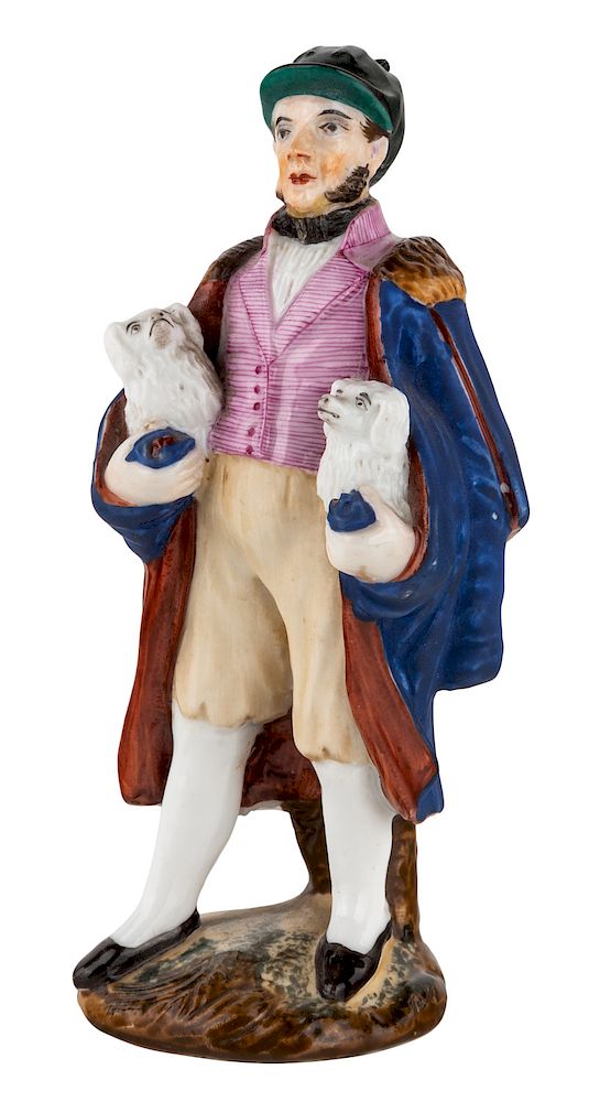 Appraisal: A RUSSIAN PORCELAIN FIGURE OF AN ENGLISHMAN WITH TWO DOGS