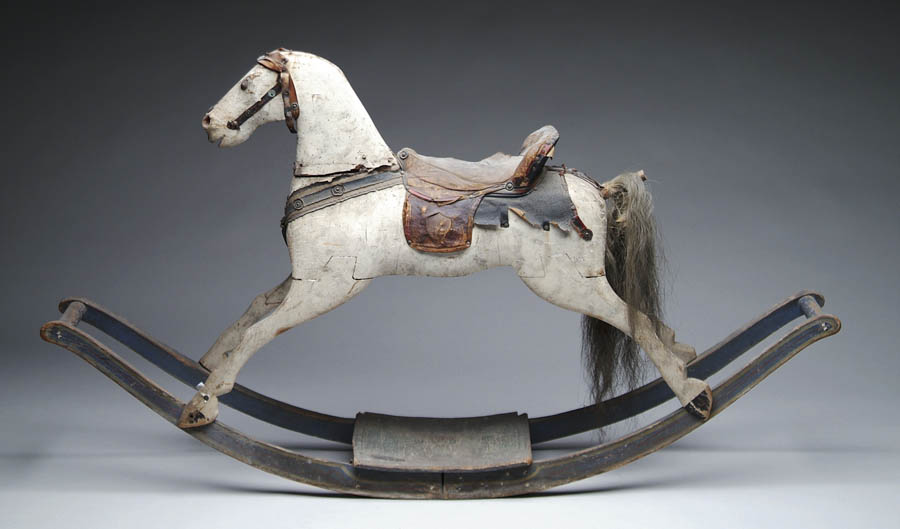 Appraisal: ANTIQUE CARVED WOOD AND PAINTED ROCKING HORSE The white horse