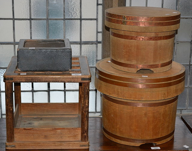 Appraisal: Two Japanese ezomatsu pine rice containerswith a stand and a