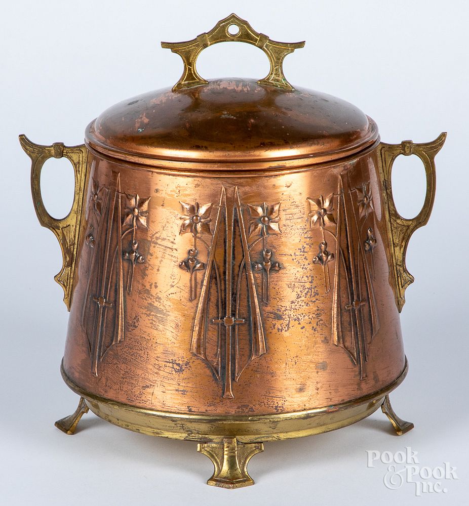 Appraisal: Aesthetic Movement brass and copper ice bucket Aesthetic Movement brass