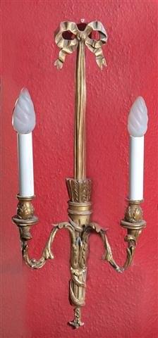 Appraisal: A SET OF EIGHT GILTWOOD AND PLASTER TORCH WALL LIGHTS