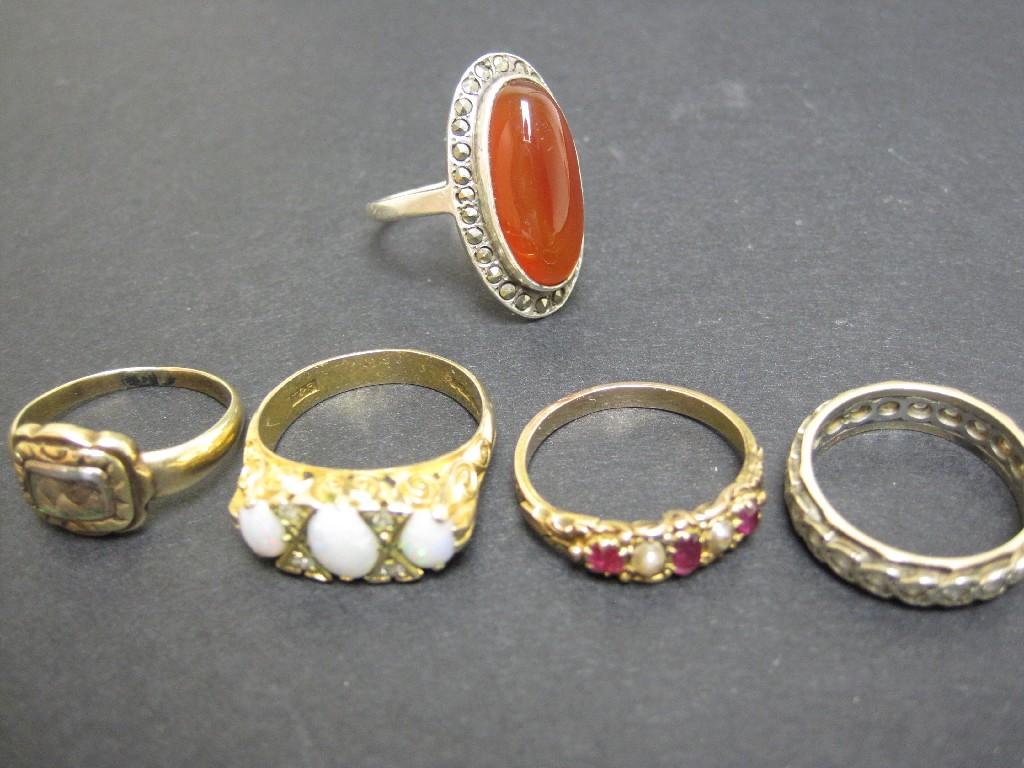 Appraisal: A ct gold Ring set three opals Ring with lock