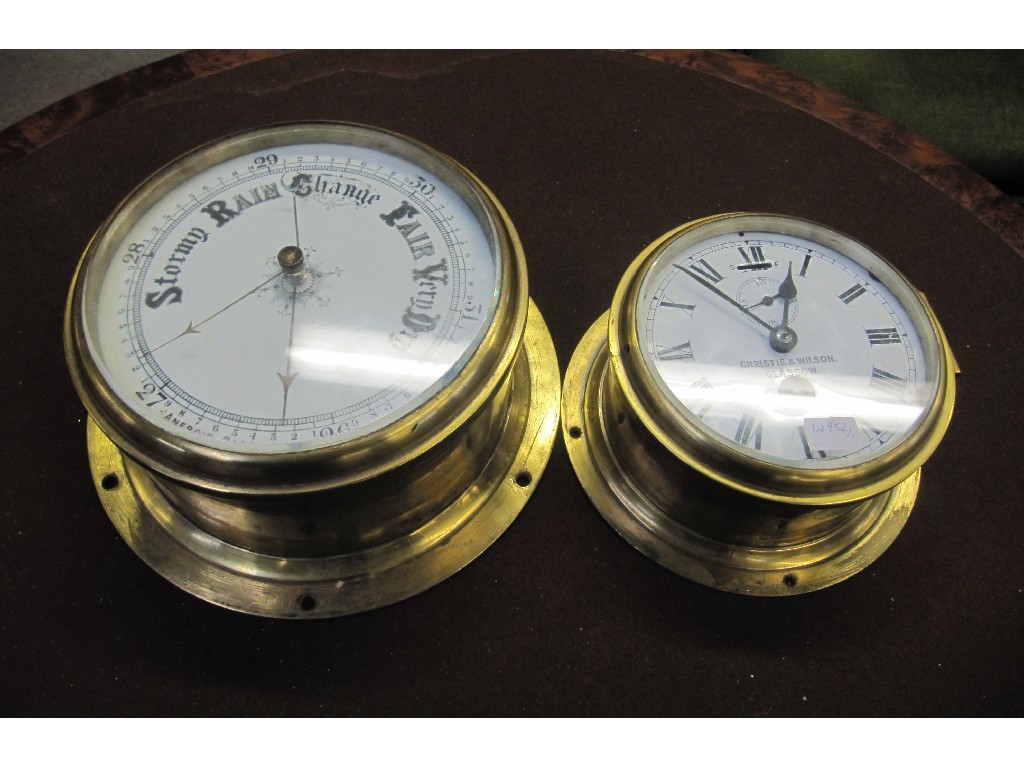 Appraisal: Victorian brass bound ships aneroid wall barometer and a ships