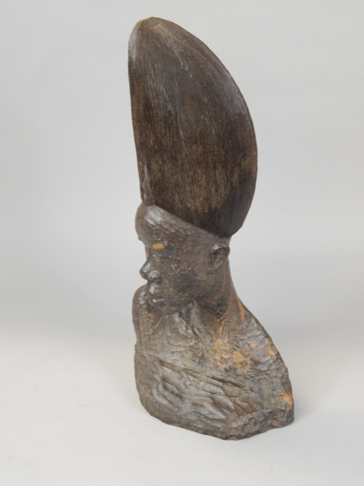 Appraisal: Felix Idubor Nigerian - An African tribal carved hardwood bust