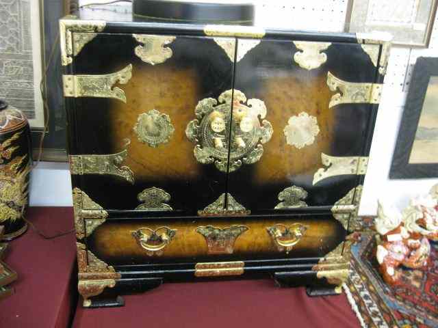 Appraisal: Oriental Lacquerware Cabinet double door with inner drawers above a