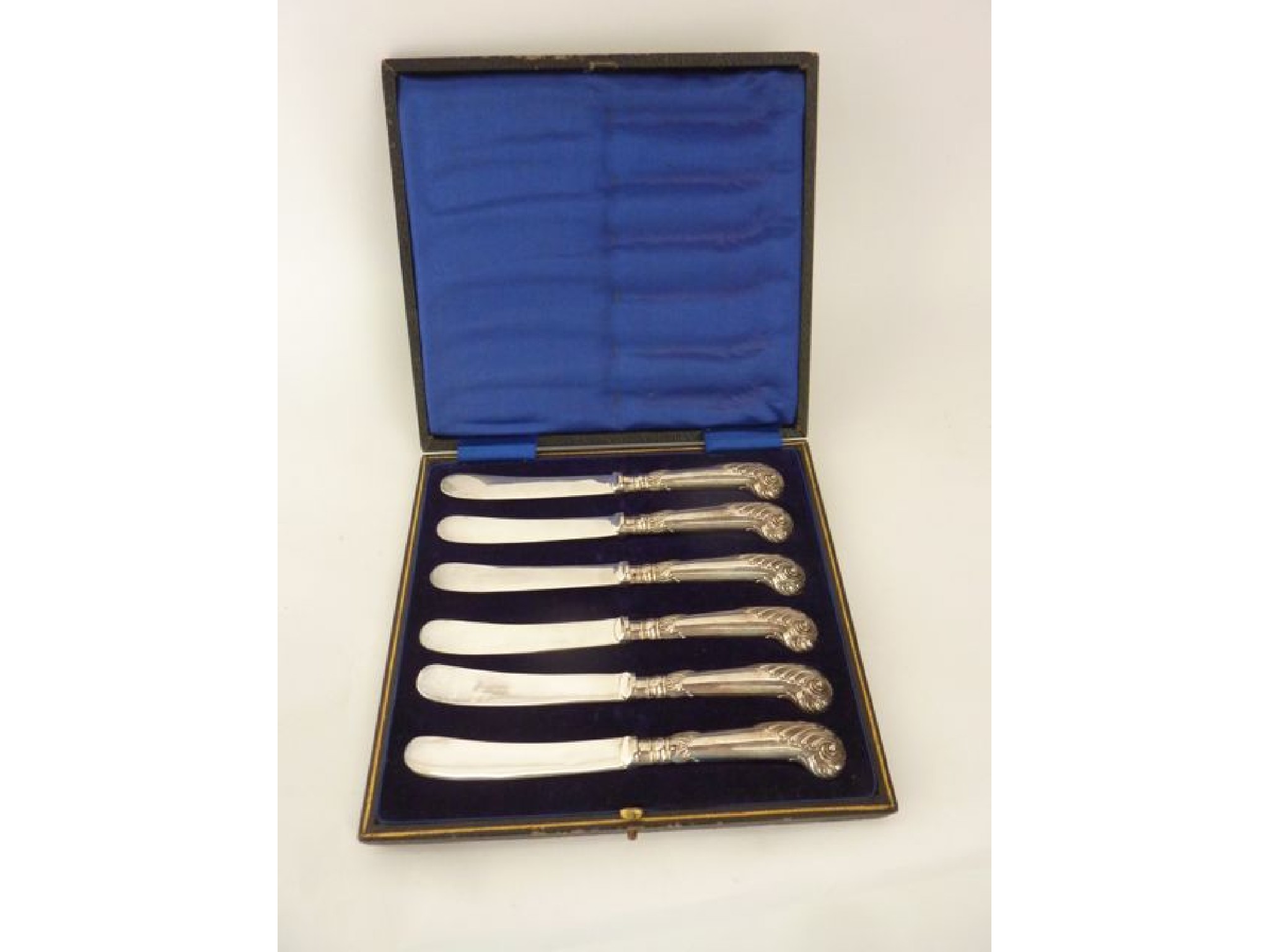 Appraisal: A cased set of six George V silver handled butter