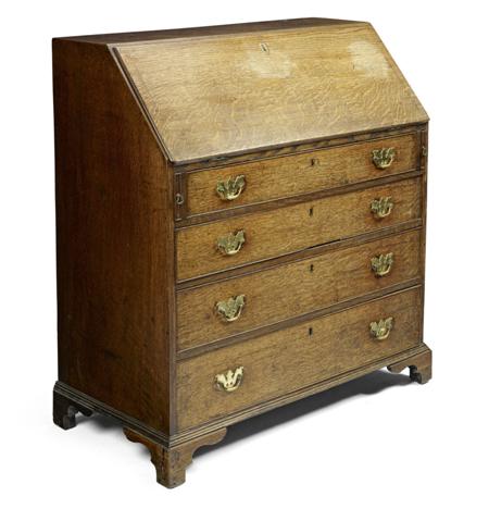 Appraisal: GEORGE III OAK BUREAU CIRCA the fall front enclosing a