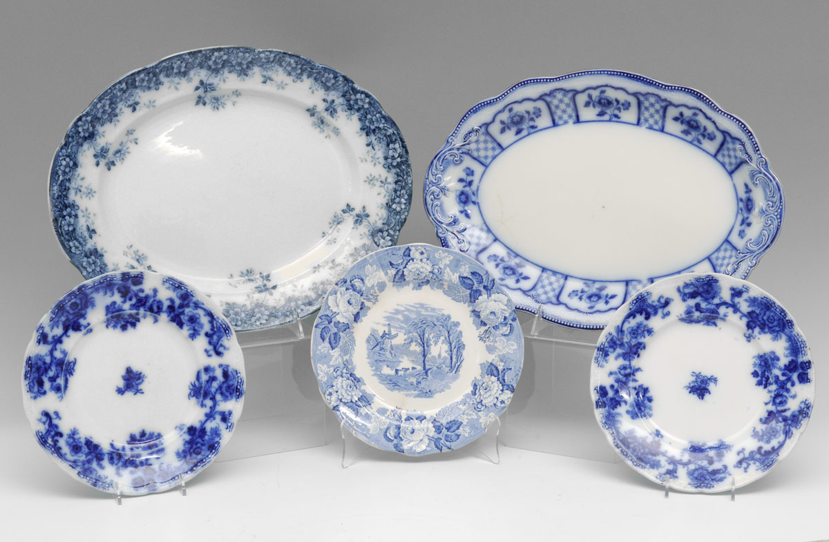 Appraisal: PIECE ENGLISH FLOW BLUE PLATTERS AND PLATES - Pair of