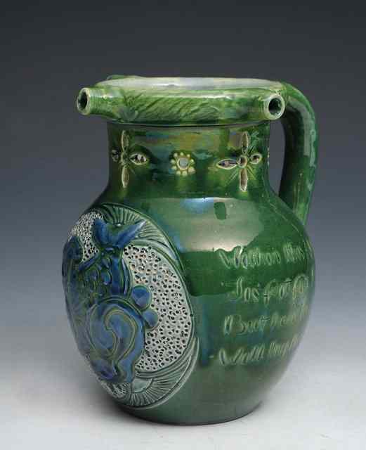 Appraisal: A C H Brannum of Barum puzzle jug decorated with