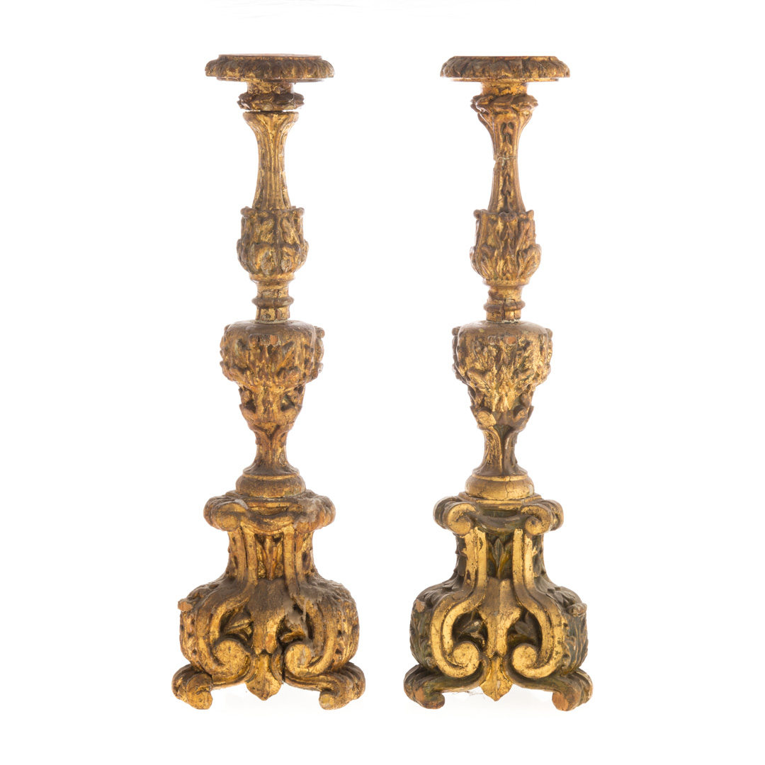 Appraisal: Pr Spanish carved and giltwood altar candlesticks th century elaborately