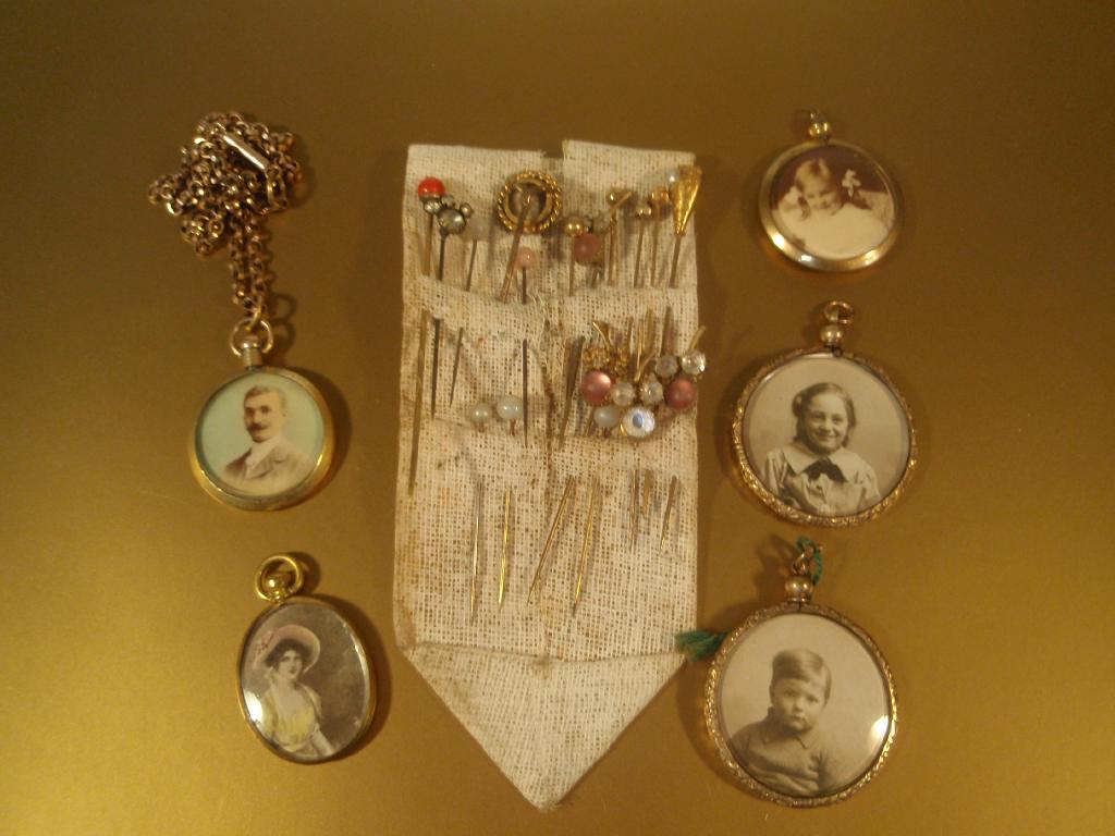 Appraisal: A small collection of stick pins and open faced photograph