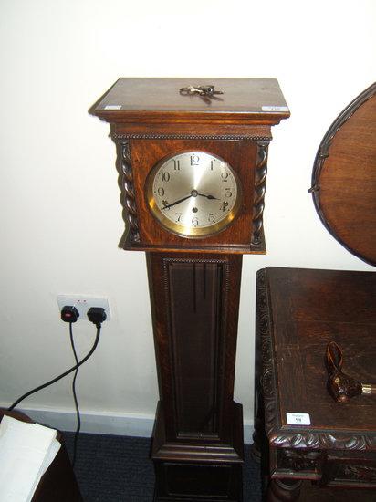 Appraisal: An oak small size long case clock with beaded front