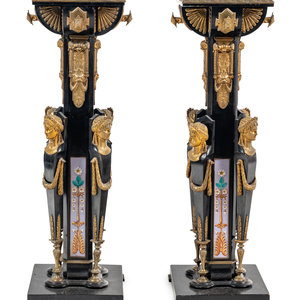 Appraisal: A Pair of Egyptian Revival Gilt Bronze and Porcelain Mounted