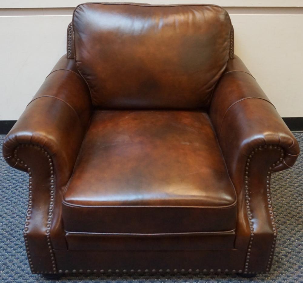 Appraisal: ABBYSON LIVING BROWN LEATHER AND NAIL STUDDED LOUNGE CHAIR L