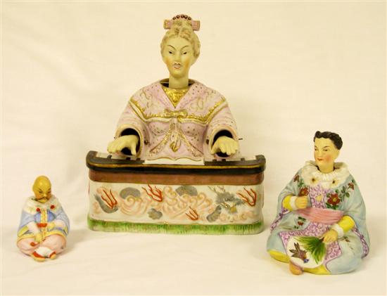 Appraisal: Three bisque porcelain nodder figurines two modeled as Asian women