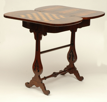 Appraisal: A VICTORIAN BURR WALNUT FOLD OVER GAMES TABLE The interior