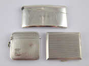 Appraisal: A small silver card case unmarked a shaped silver card