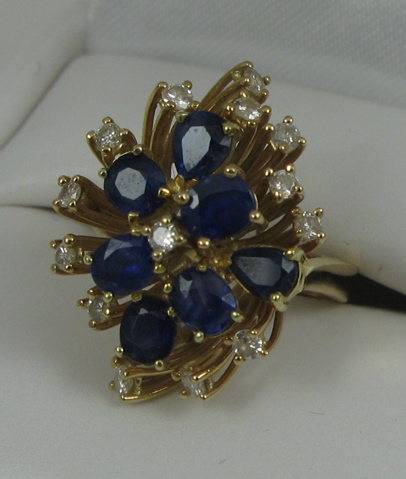 Appraisal: SAPPHIRE DIAMOND AND FOURTEEN KARAT GOLD RING with appraisal Set