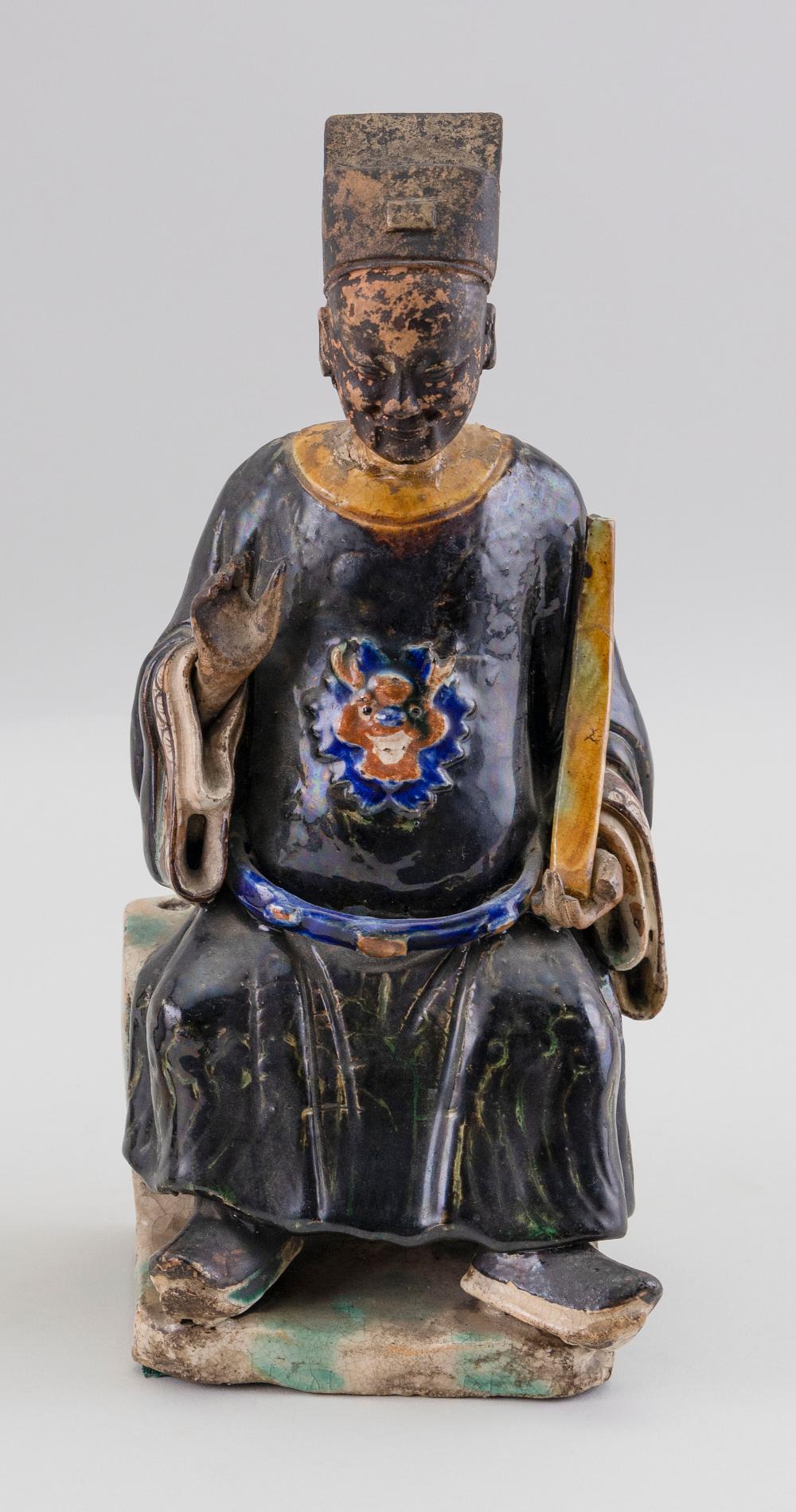 Appraisal: CHINESE POTTERY FIGURE OF SEATED OFFICIAL HOLDING A SCEPTER MING