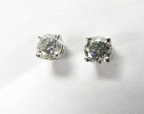 Appraisal: A pair of K white gold mounted ctw diamond stud