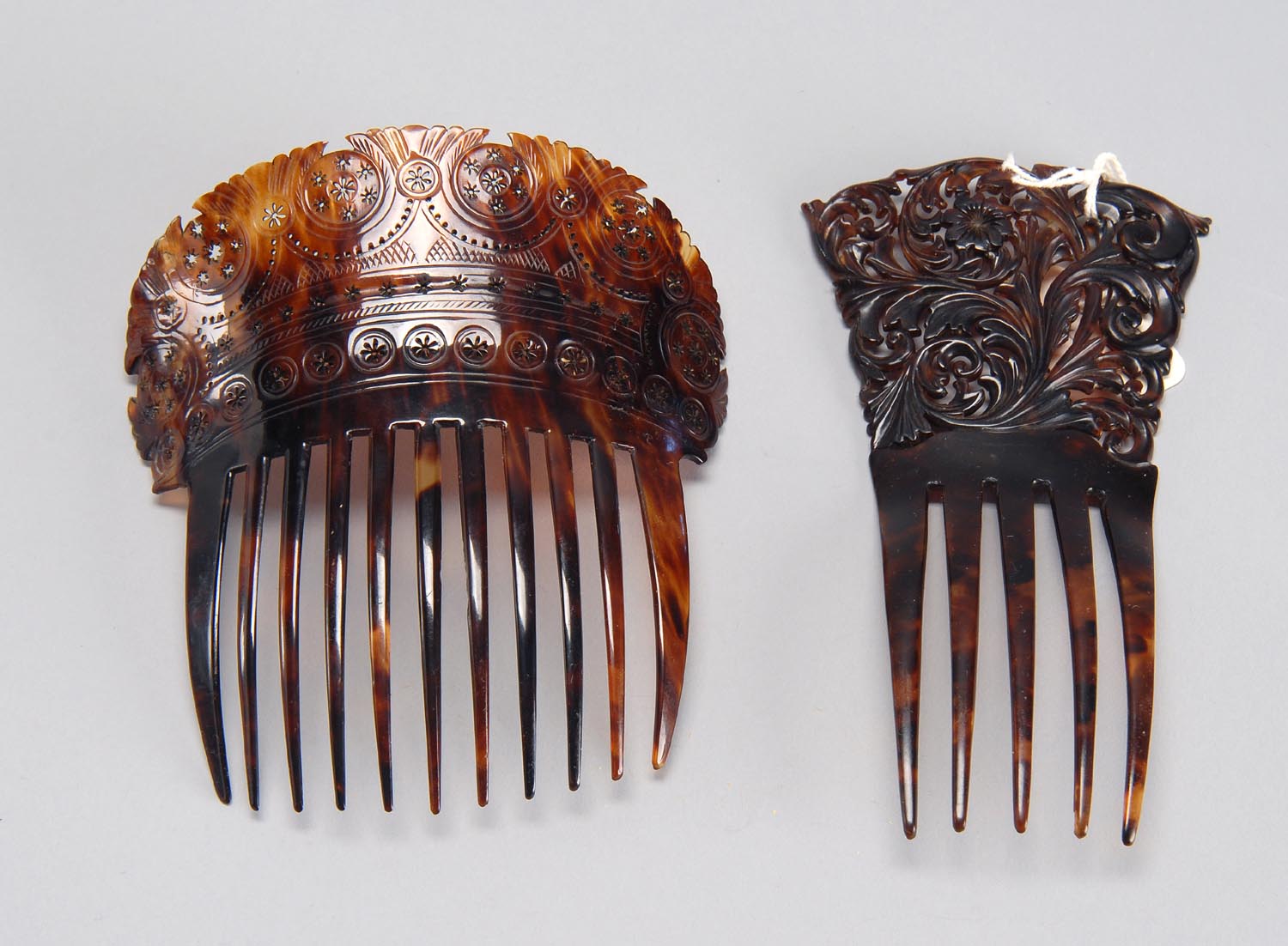 Appraisal: TWO CARVED SHELL HAIR COMBS Late th CenturyLengths from to