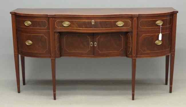 Appraisal: Custom mahogany serpentine front inlaid North Shore type sideboard Has