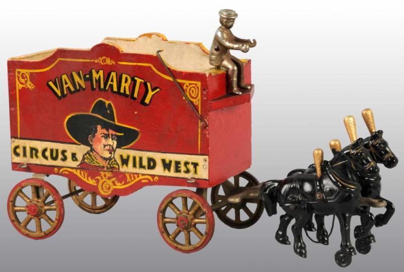 Appraisal: Cast Iron Wood Arcade Van-Marty Wagon Toy Description Includes one