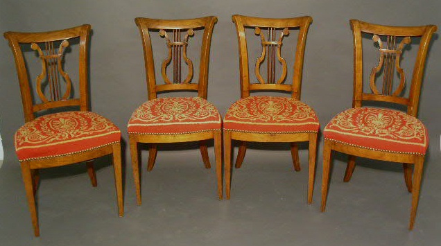 Appraisal: Four fruitwood side chairs thc with needlepoint seats h x