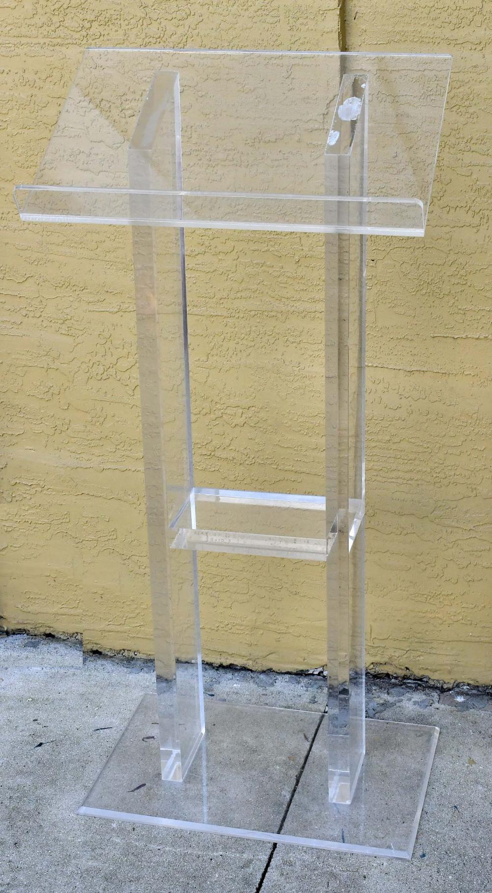 Appraisal: CONTEMPORARY ACRYLIC LECTERN PAIR OF MAGAZINE STANDSThe lectern with a