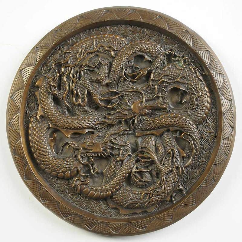 Appraisal: Chinese Cast Bronze Dragon Plaque th century heavy relief decorated