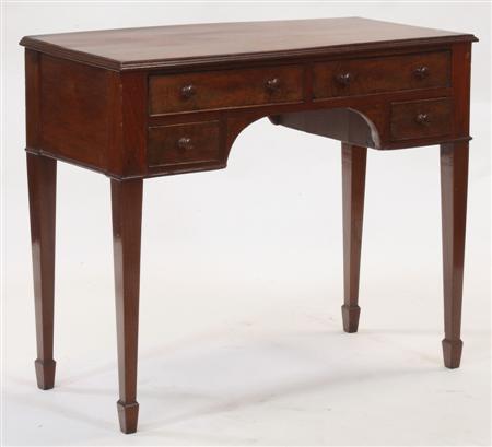 Appraisal: A th century mahogany kneehole desk the moulded rectangular top