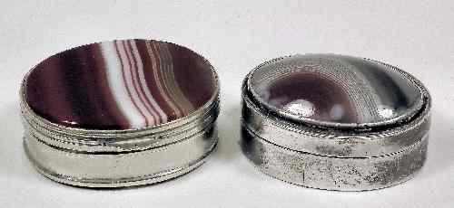 Appraisal: A George III silver oval vinaigrette the lid set with